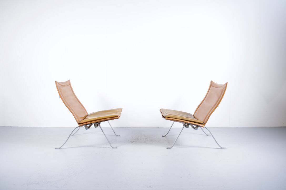 Imposing pair of leather and steel armchairs from the 1960s