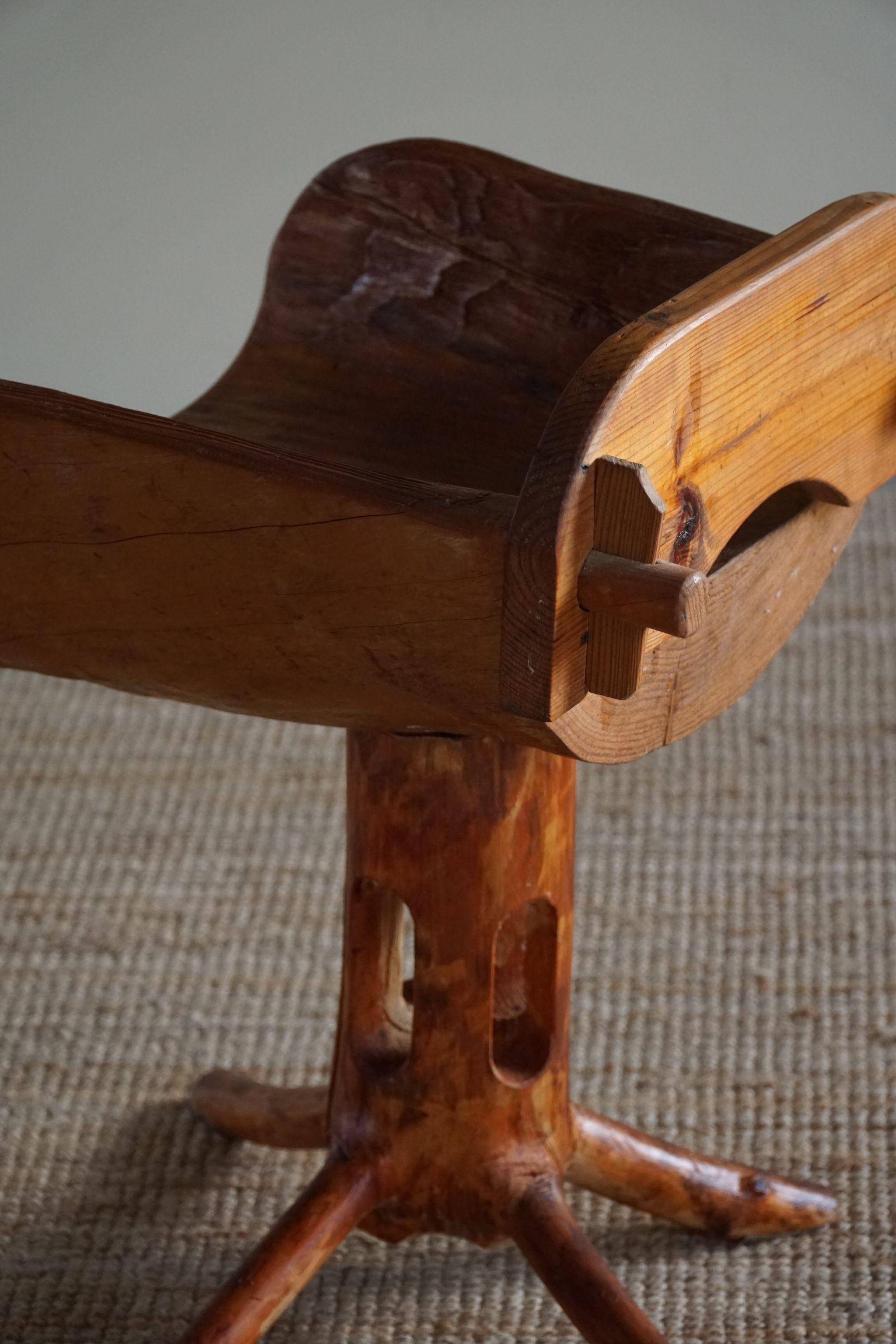 Unique sculptural pedestal armchair by the Finnish Matti Martikka in solid pine, 1960s.