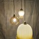 Suspension triple opaline with engraved and frosted glass in shades of yellow-orange.