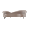 Heart upholstered curved back sofa with wooden legs