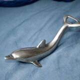 Vintage metal bottle opener dolphin