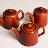 3 brown glazed ceramic teapots