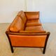 Canapé vintage danois des années 60 en cuir cognac pour 2 personnes.