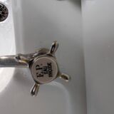 Set of a sink and its retro ceramic splashback.