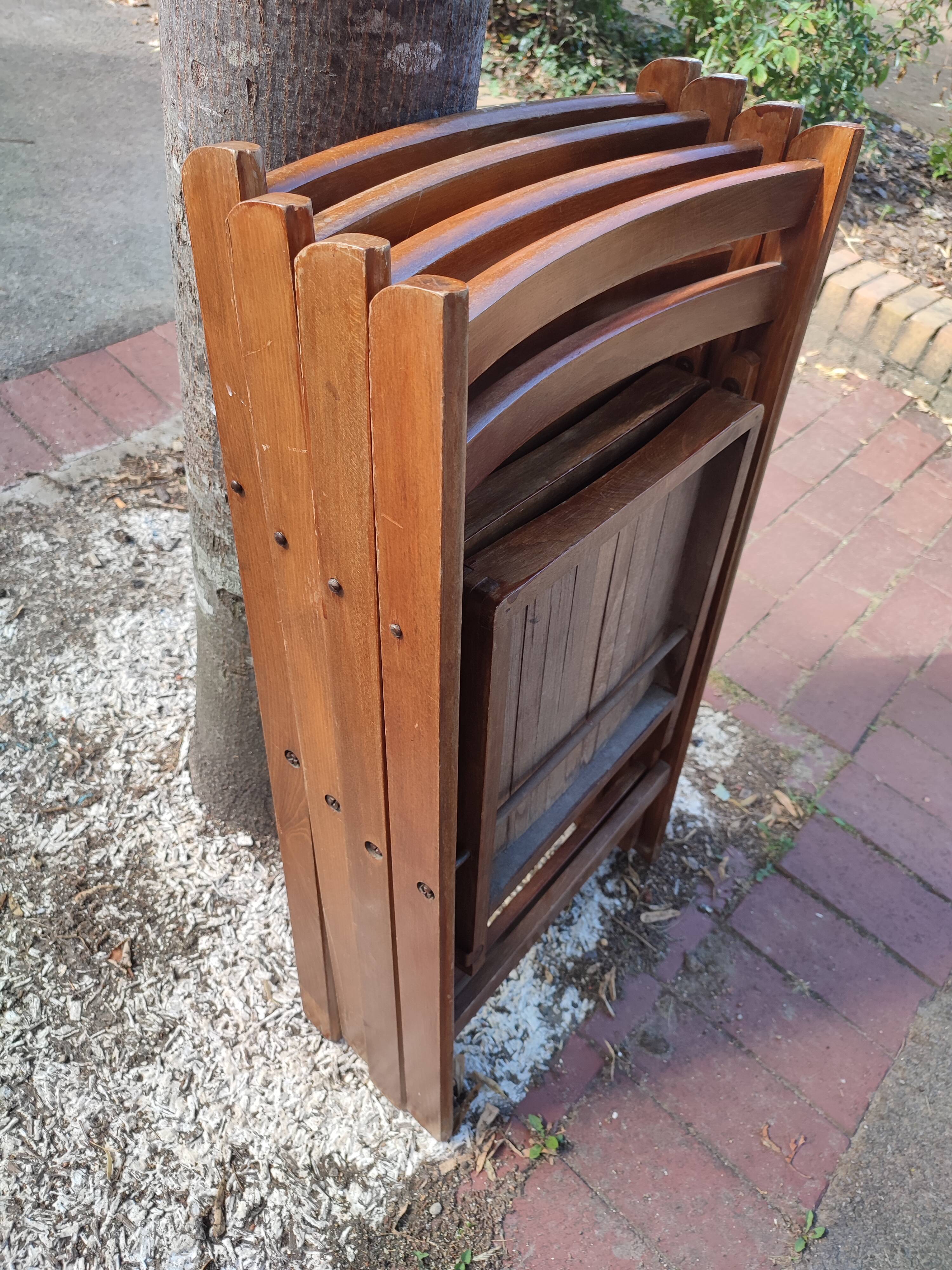 4 folding teak chairs