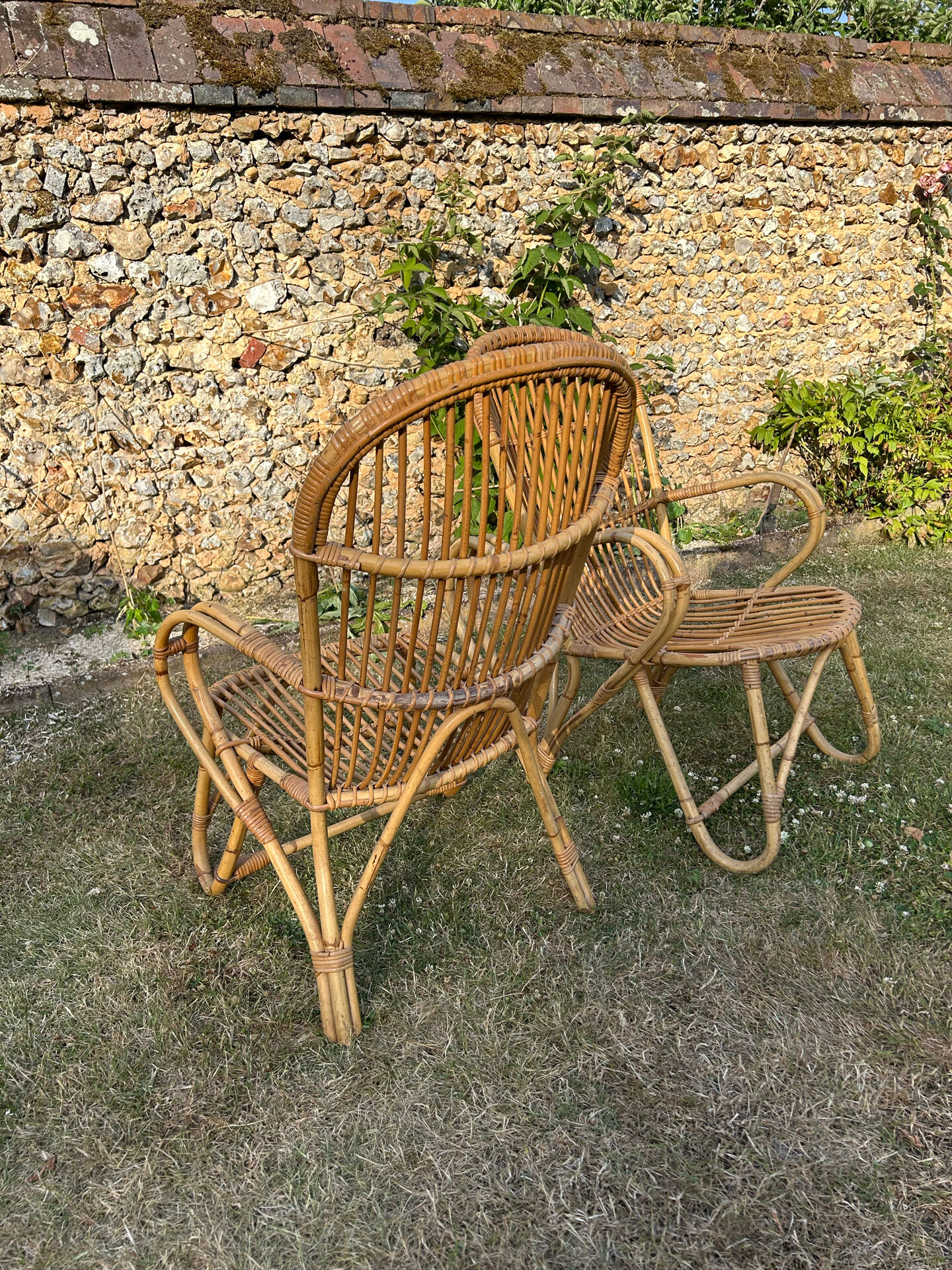 Pair of vintage rattan armchairs from the 1960s.