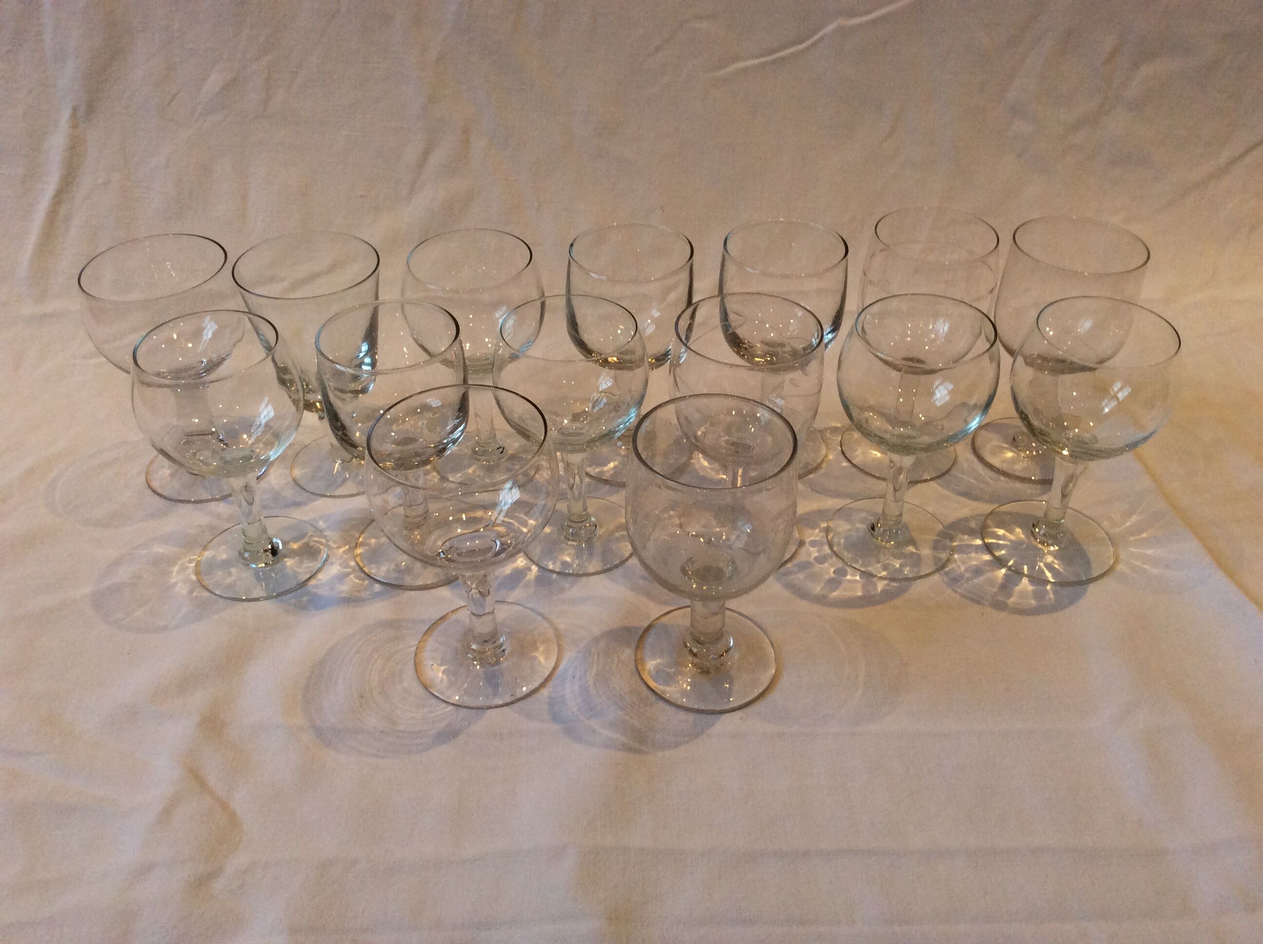 15 mismatched old glasses