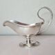 silver metal gravy boat