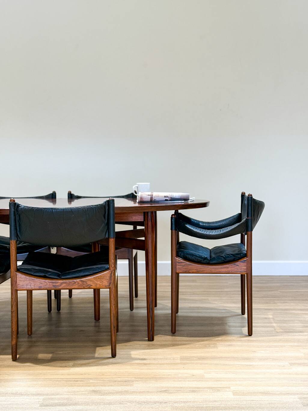 Extendable dining room table and chairs (by Kristian Solmer Vedel)