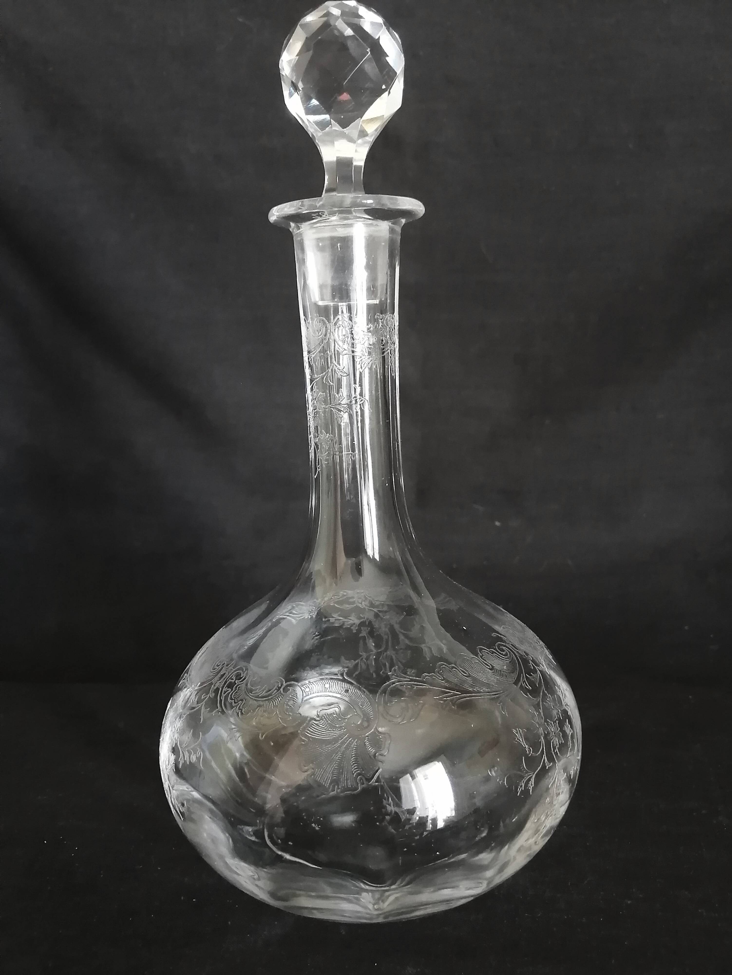 9 crystal white wine glasses from St. Louis model Cléo and their decanter.