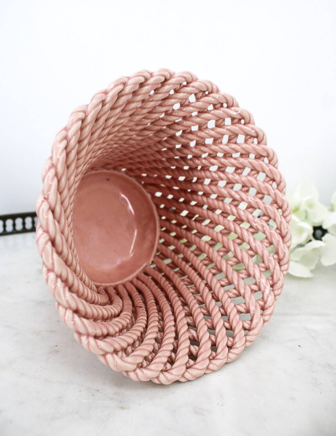 Small vintage handmade plant pot in pink woven ceramic
