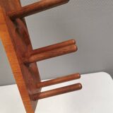 Beautiful Danish wine rack/holder for 3 bottles of wine on the wall. 1980s