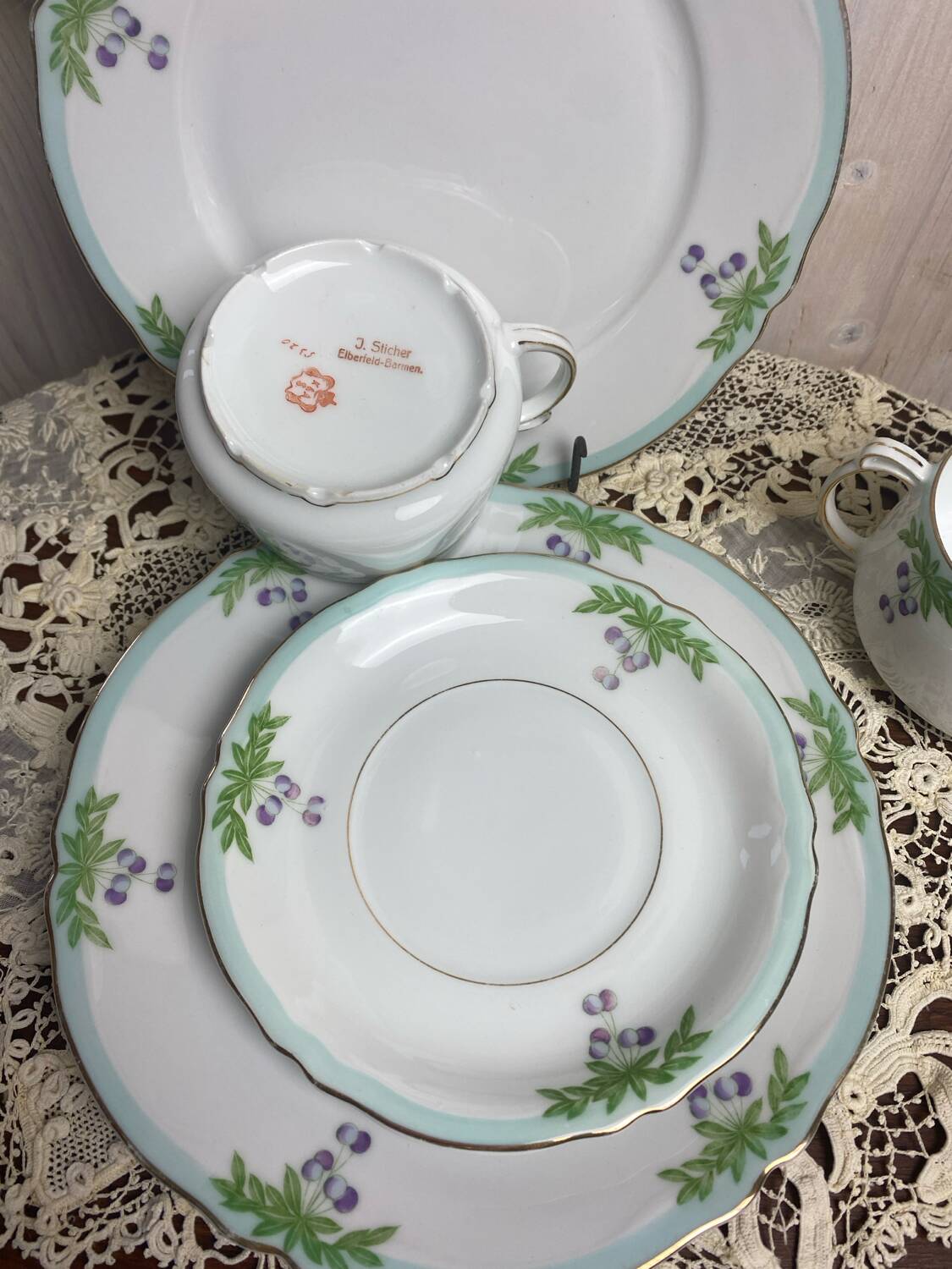 Set of 2 antique porcelain chocolate services.