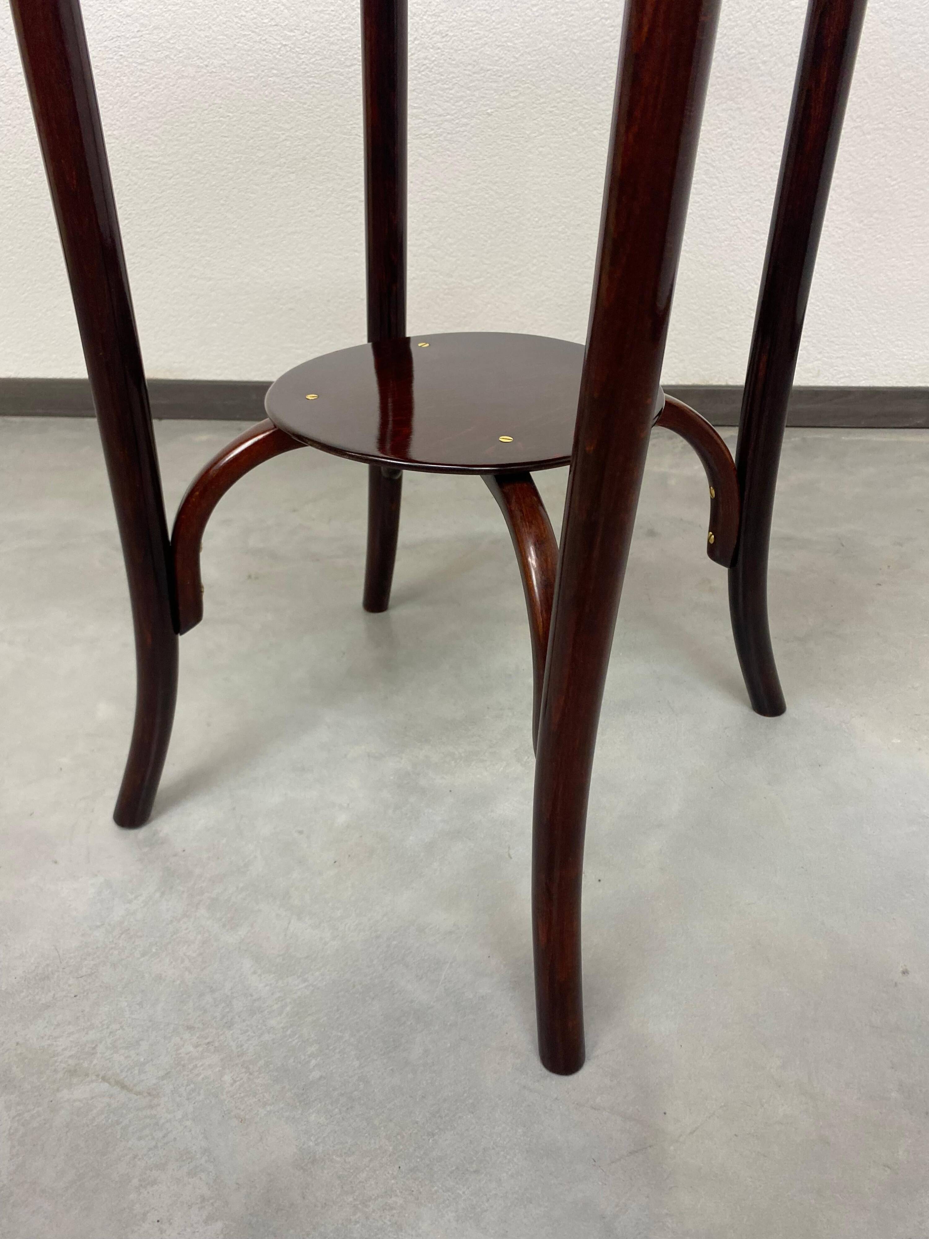 Round coffee table by Thonet