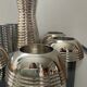 Series of 8 vintage candlesticks in silver metal