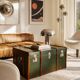 Vintage wooden and metal green travel trunk, circa 1930.