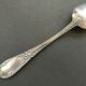 Set of 11 SFAM silver metal teaspoons.