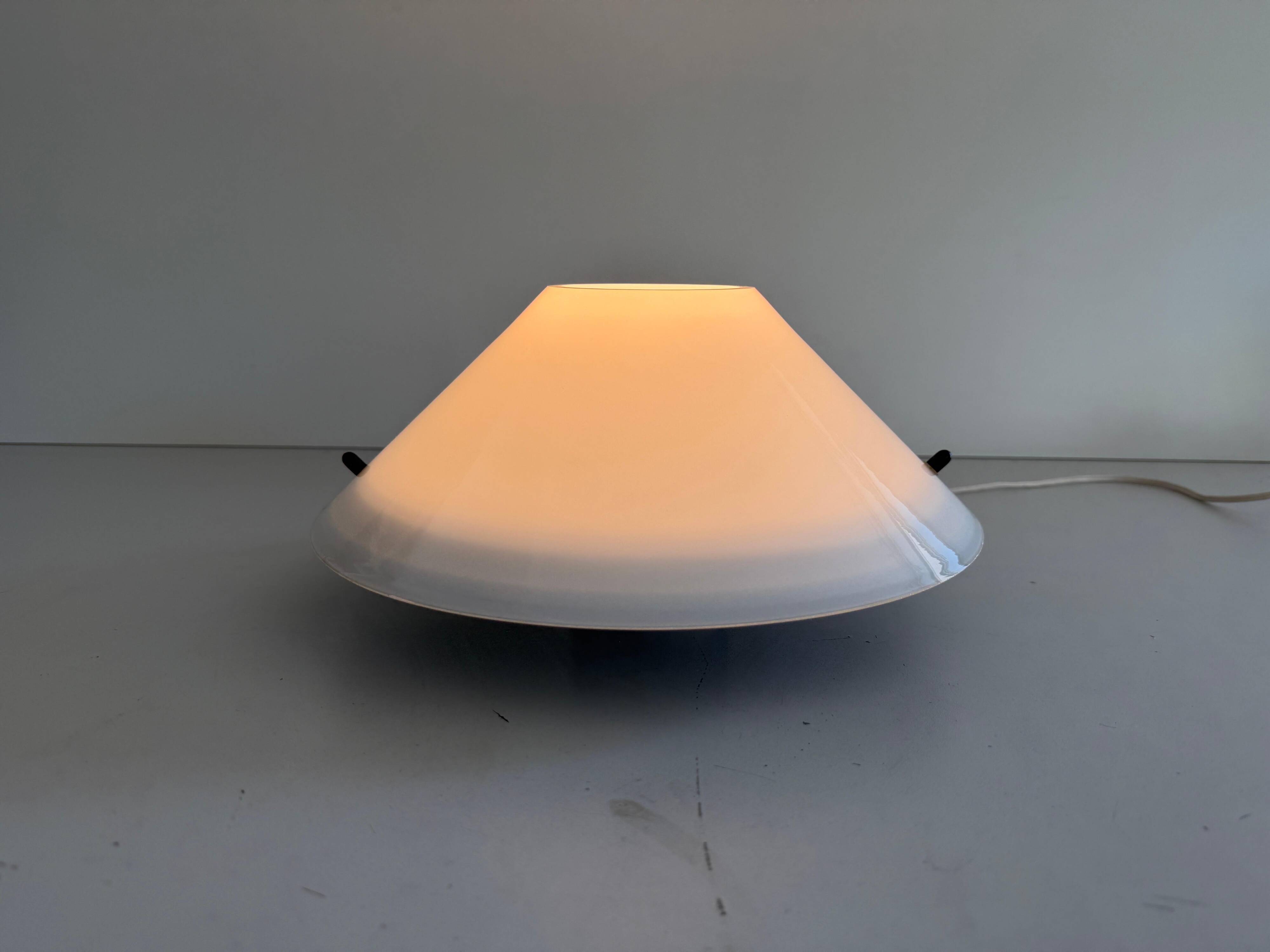 Simple opal glass wall light from the mid-century by Lamperti, 1960s, Italy.