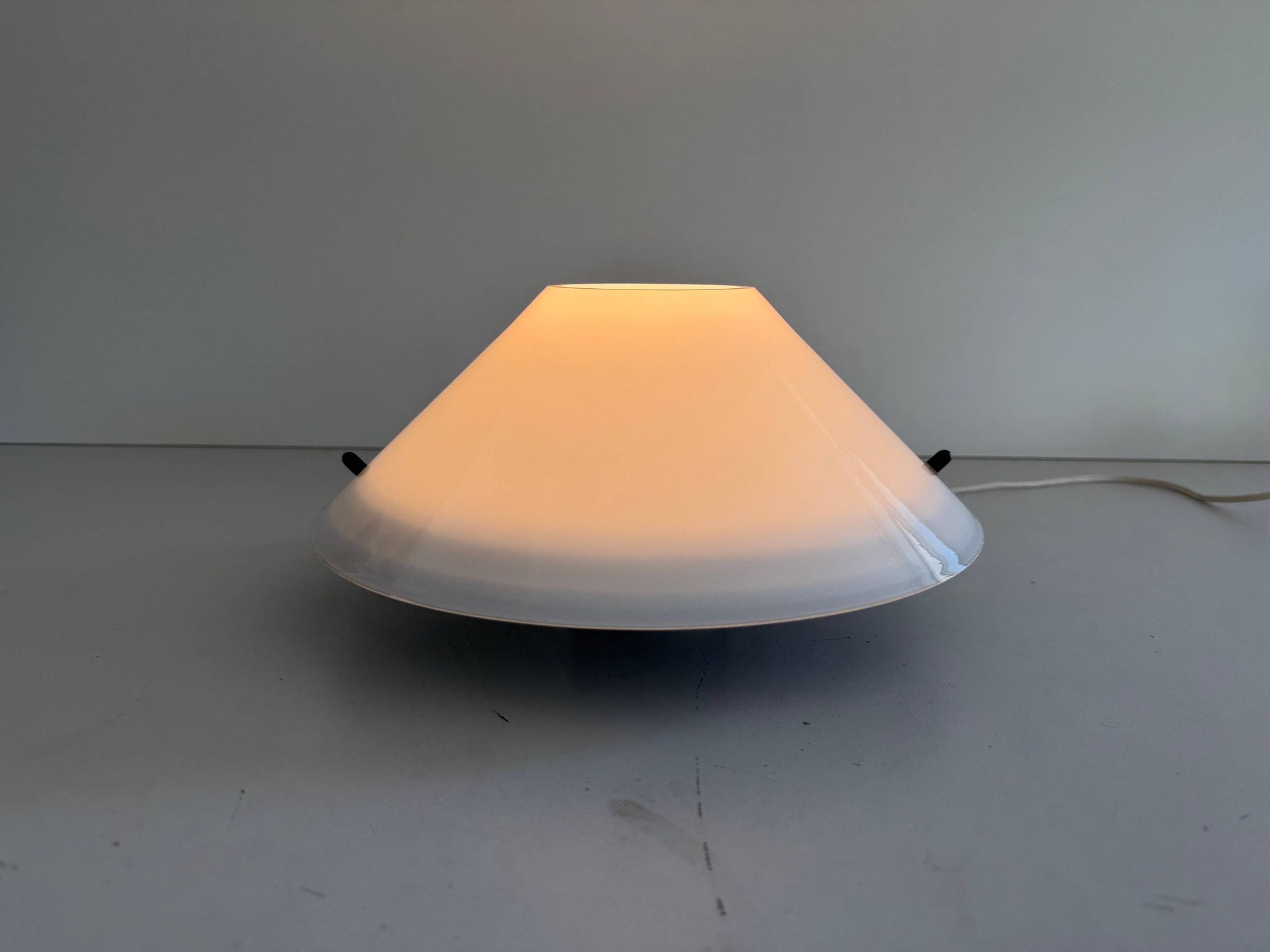 Simple opal glass wall light from the mid-century by Lamperti, 1960s, Italy.