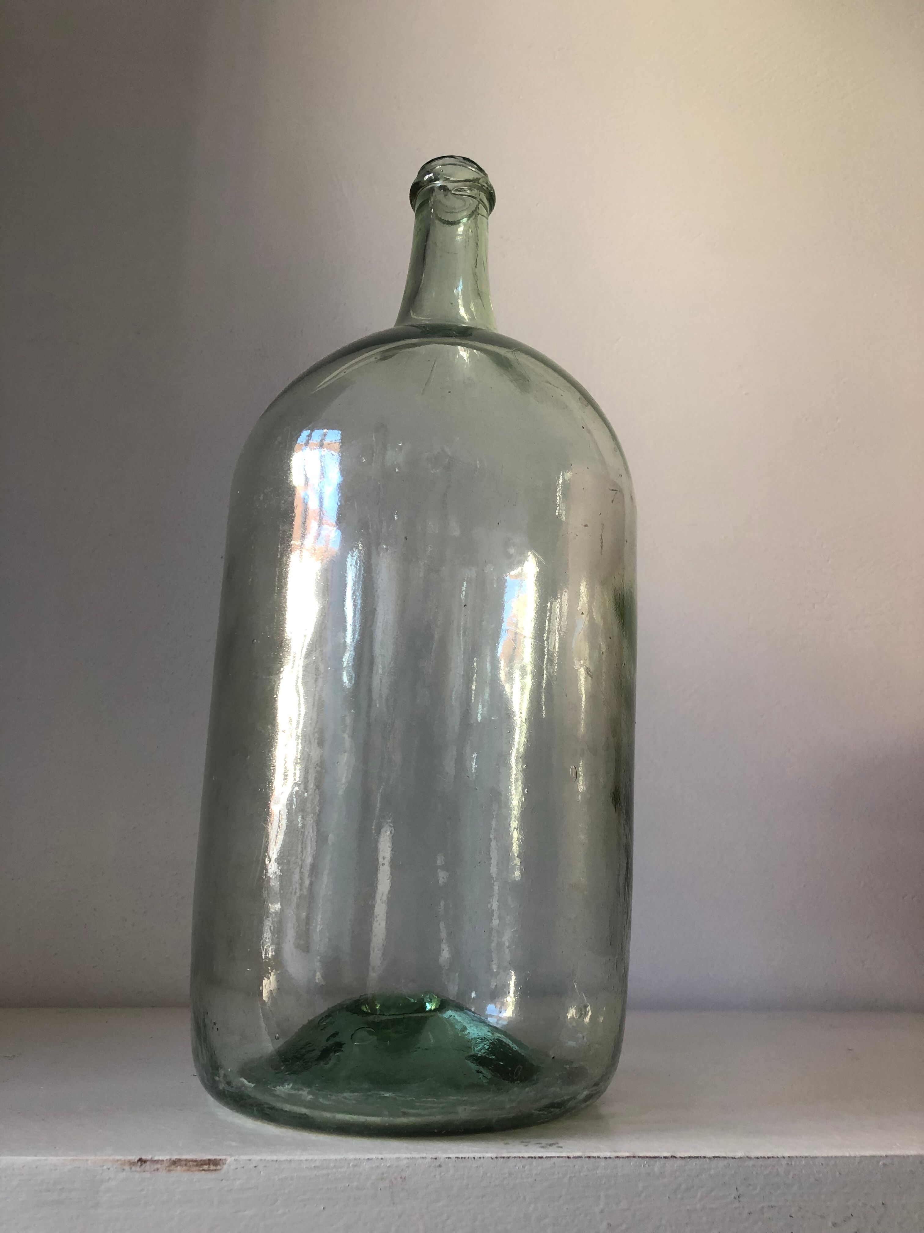 Demijohn old bottle