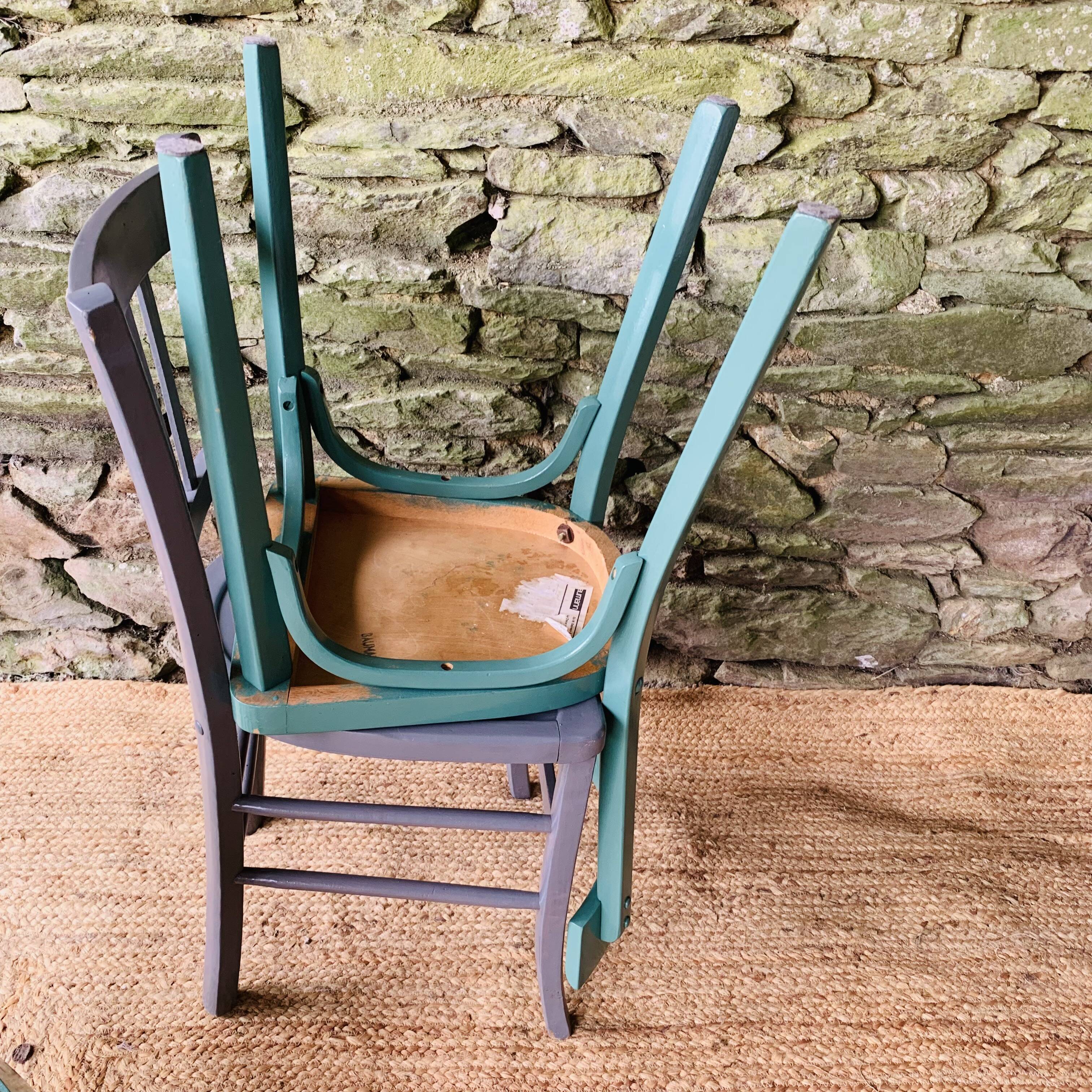 Set of four mismatched bistro chairs