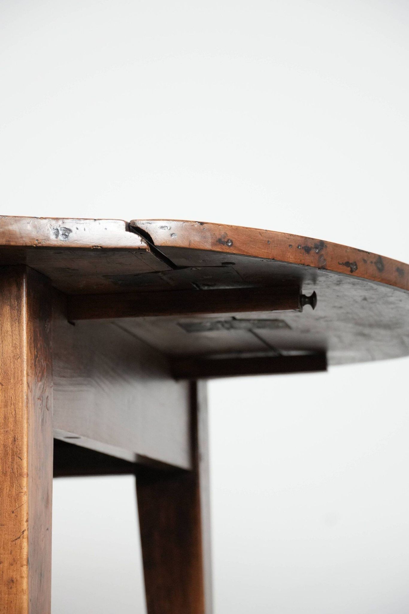 Rare antique oval French extendable dining table made of fruitwood