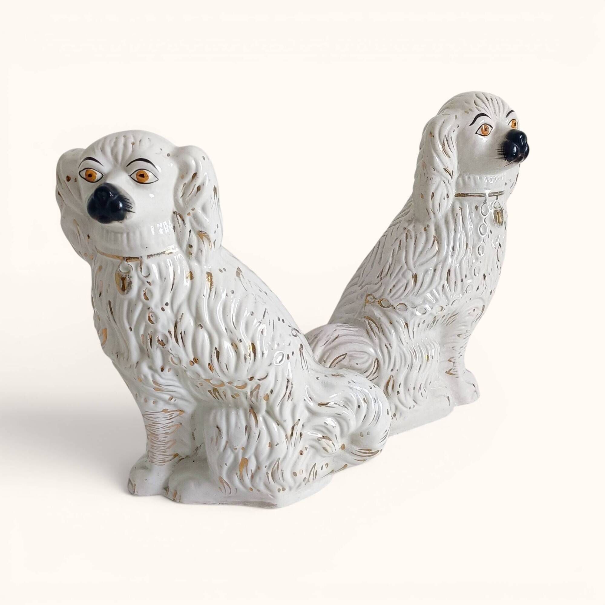 Pair of King Charles Spaniel dogs in Staffordshire majolica style.