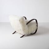 Pair of Jindrich Halabala H 269 lounge chairs in mongolian sheepskin