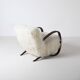 Pair of Jindrich Halabala H 269 lounge chairs in mongolian sheepskin