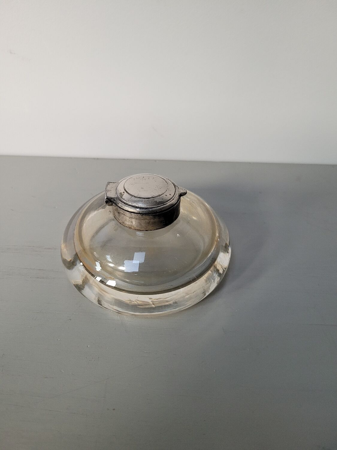 Old glass inkwell