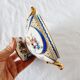 Tasse et soucoupe en porcelaine reproduction de sèvres décorées à la main par m.carpezat pour limoge