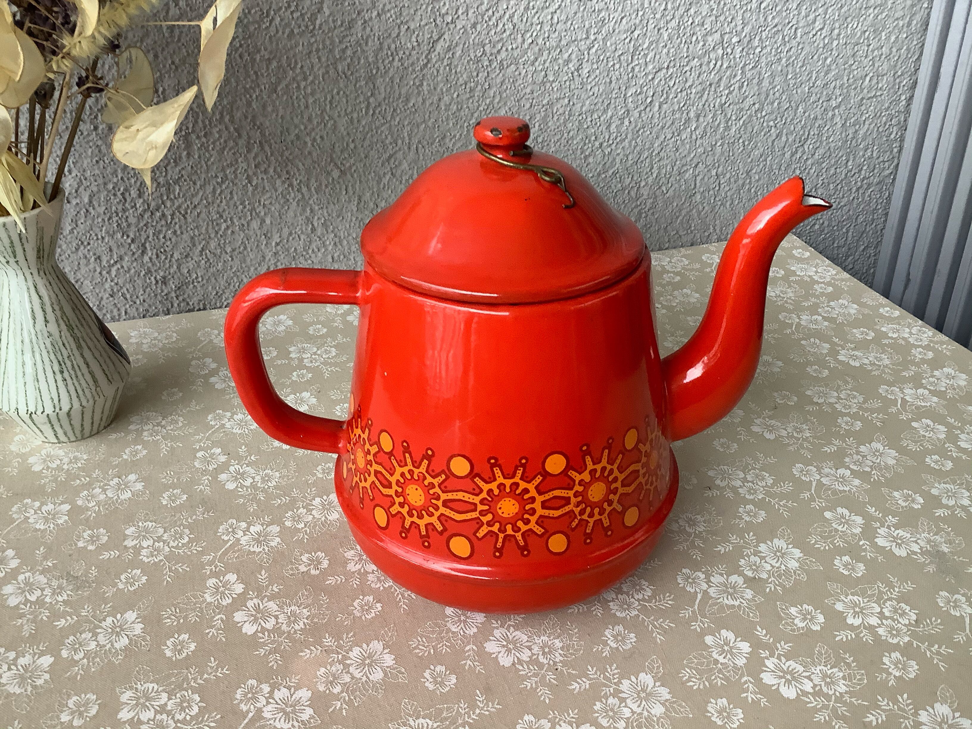 Vintage red enamelled tin teapot