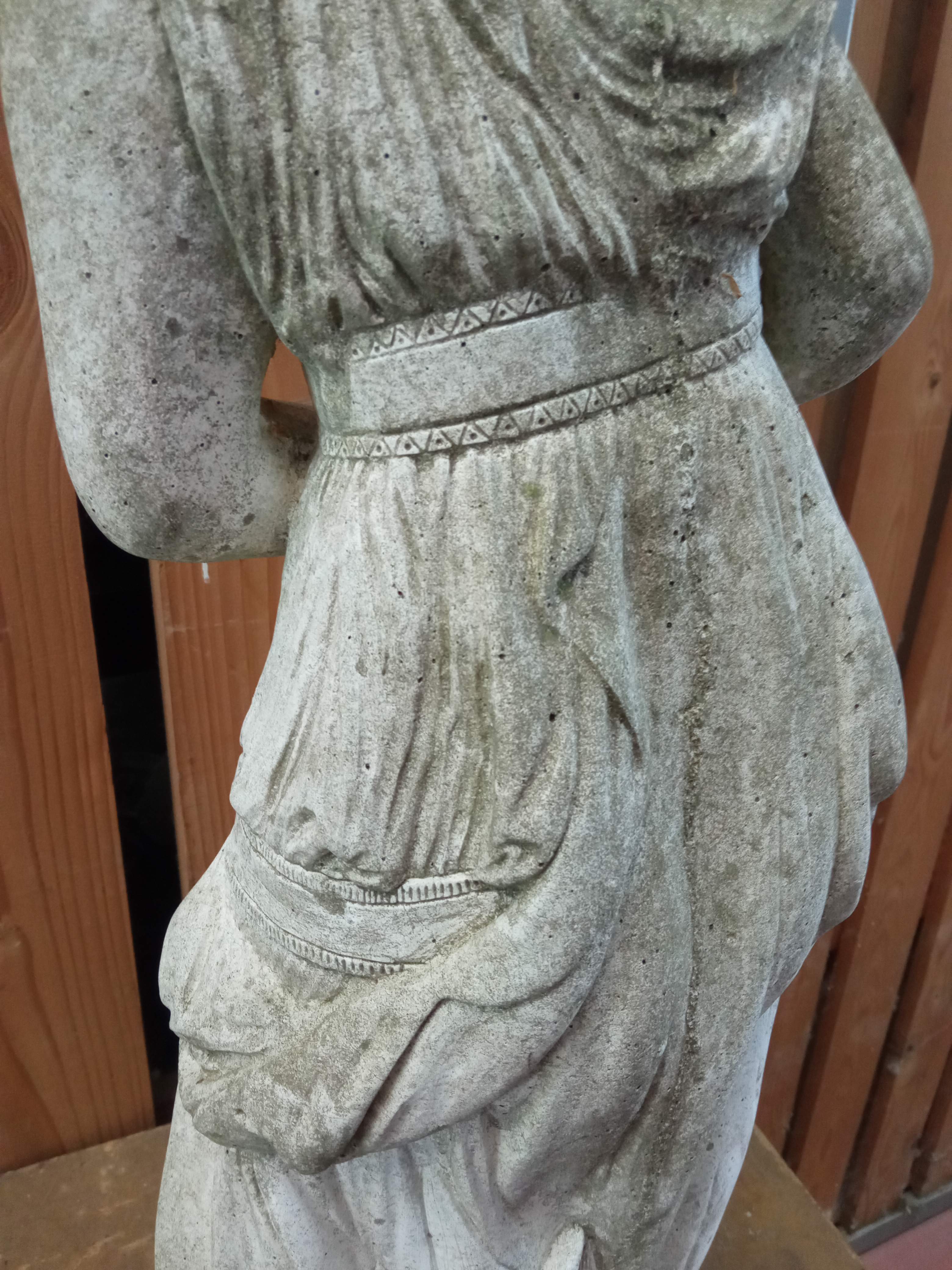 Reconstructed stone garden statue