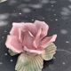 Pink candle holder in slip, old biscuit