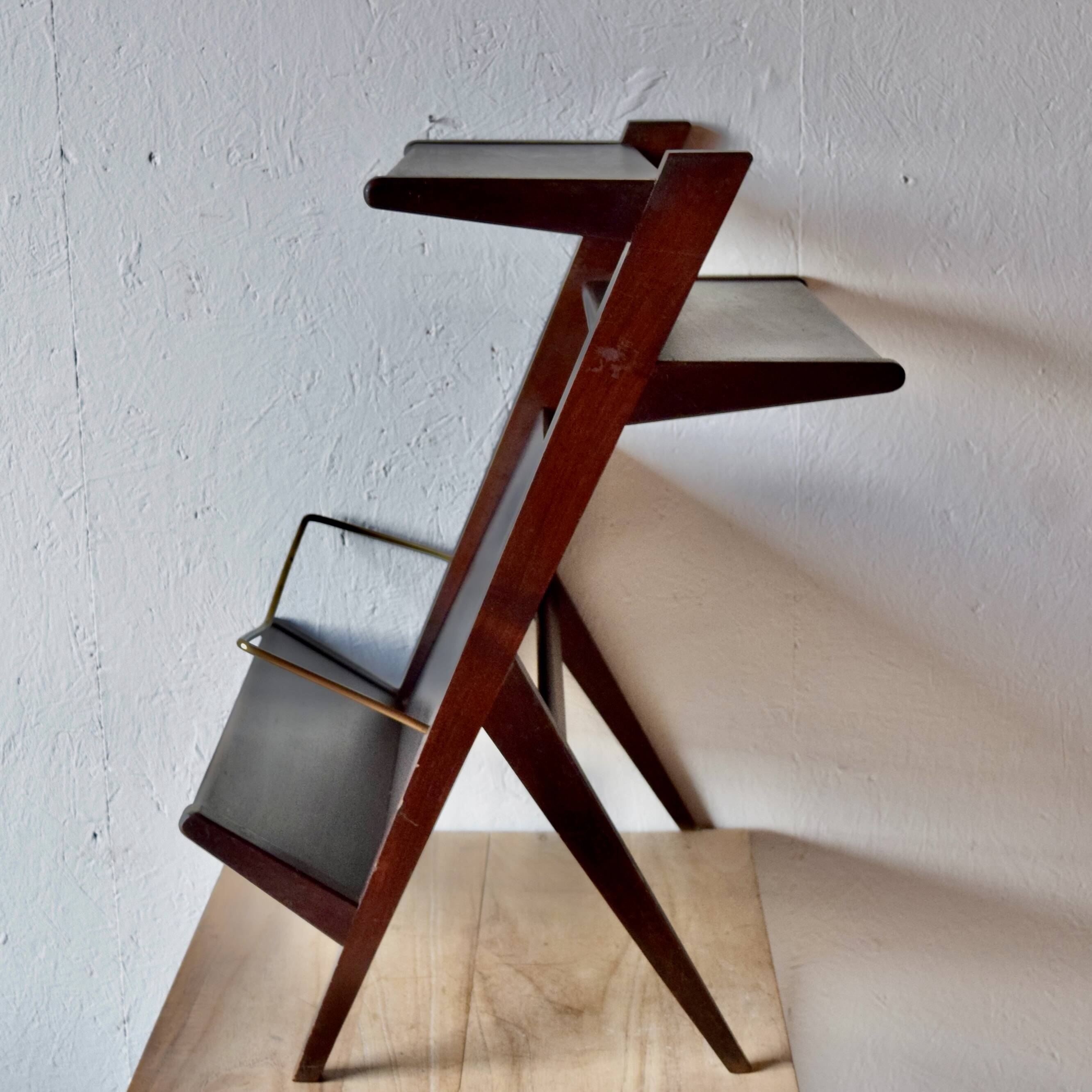 Old Scandinavian style magazine rack in dark wood with integrated brass ashtray
