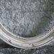 Wooden oval frame with Louis XVI-style knot