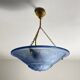 Blue pressed glass basin with Art Deco geometric patterns