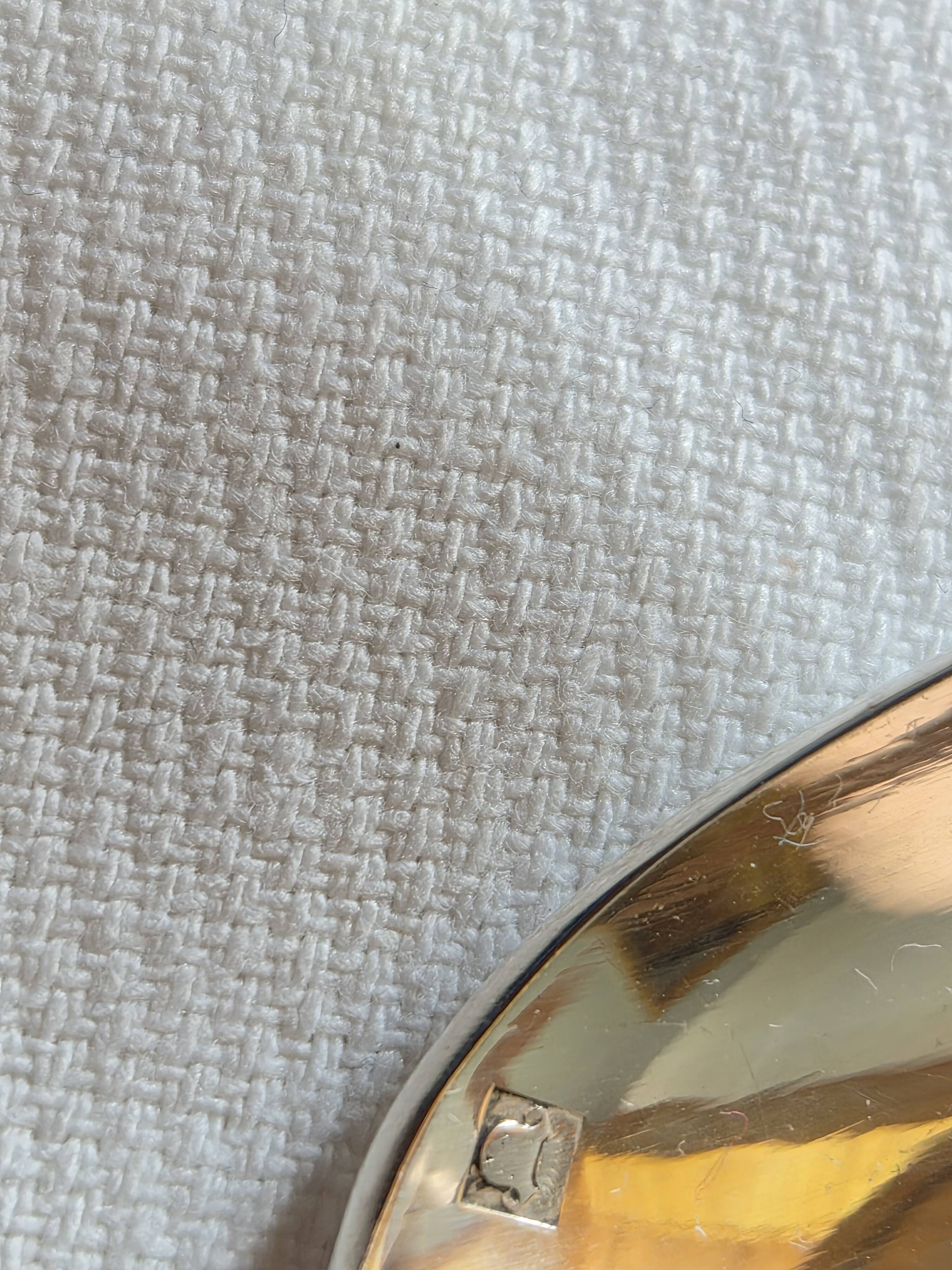 12 silver-plated metal teaspoons with a hallmark of 18.