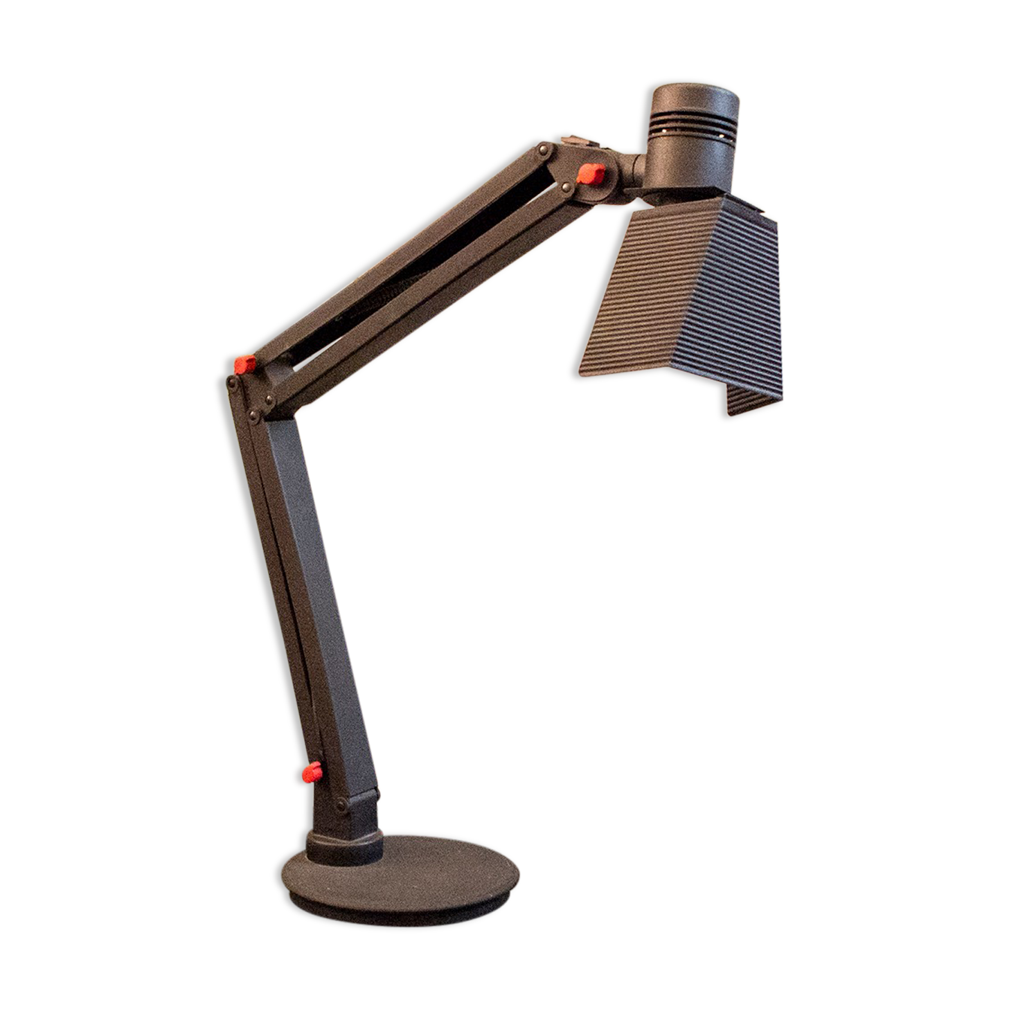 Desk lamp with metal frame and plastic details. Designer C.V.B. 80s