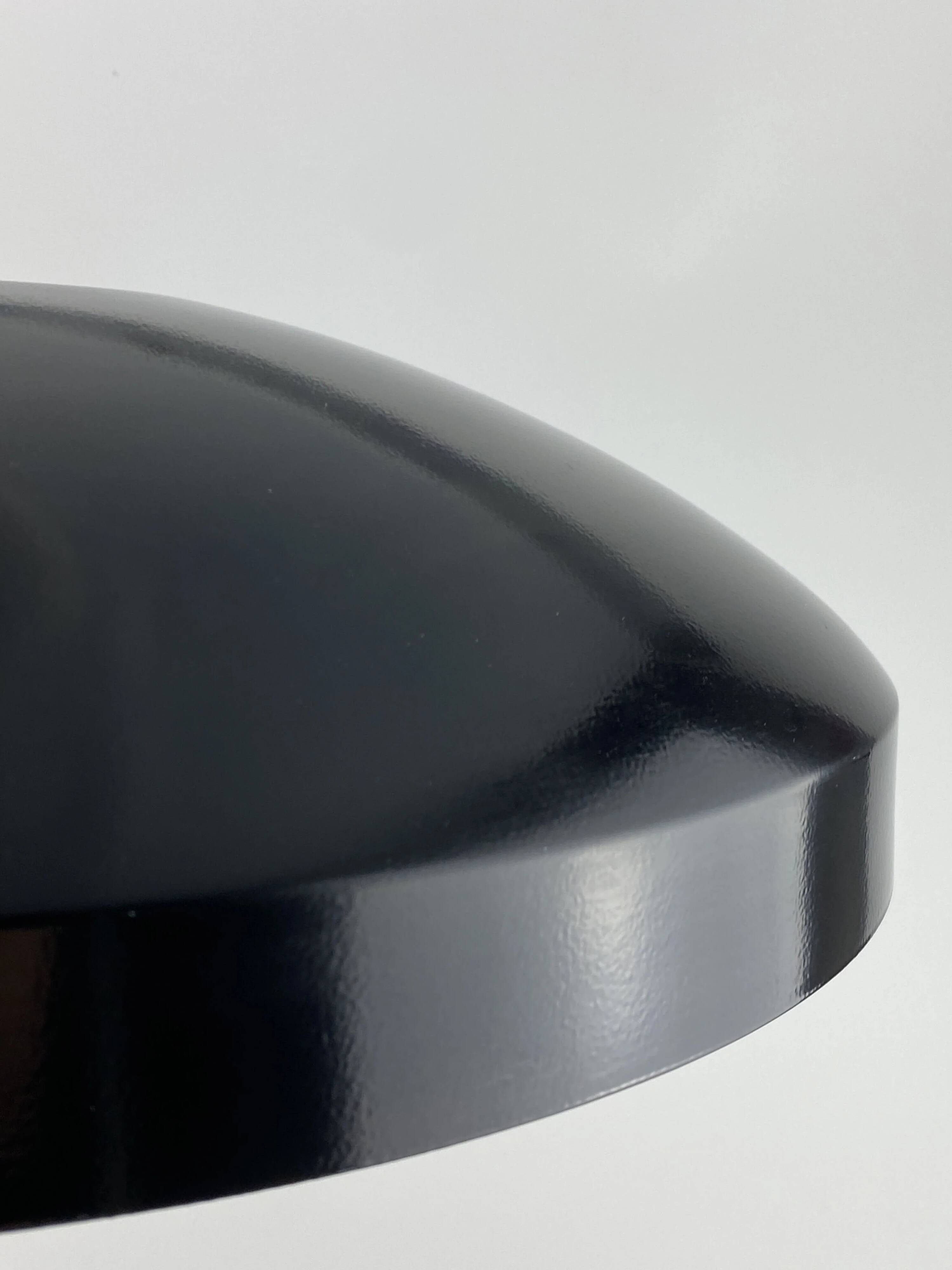 Rare black and gold UFO table lamp by Louis Kalff for Philips.