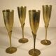4 flutes, brass champagne glasses