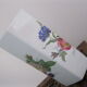 Flowery white porcelain faceted vase