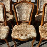 8 cherry wood chairs in Louis XV style with velvet upholstery.