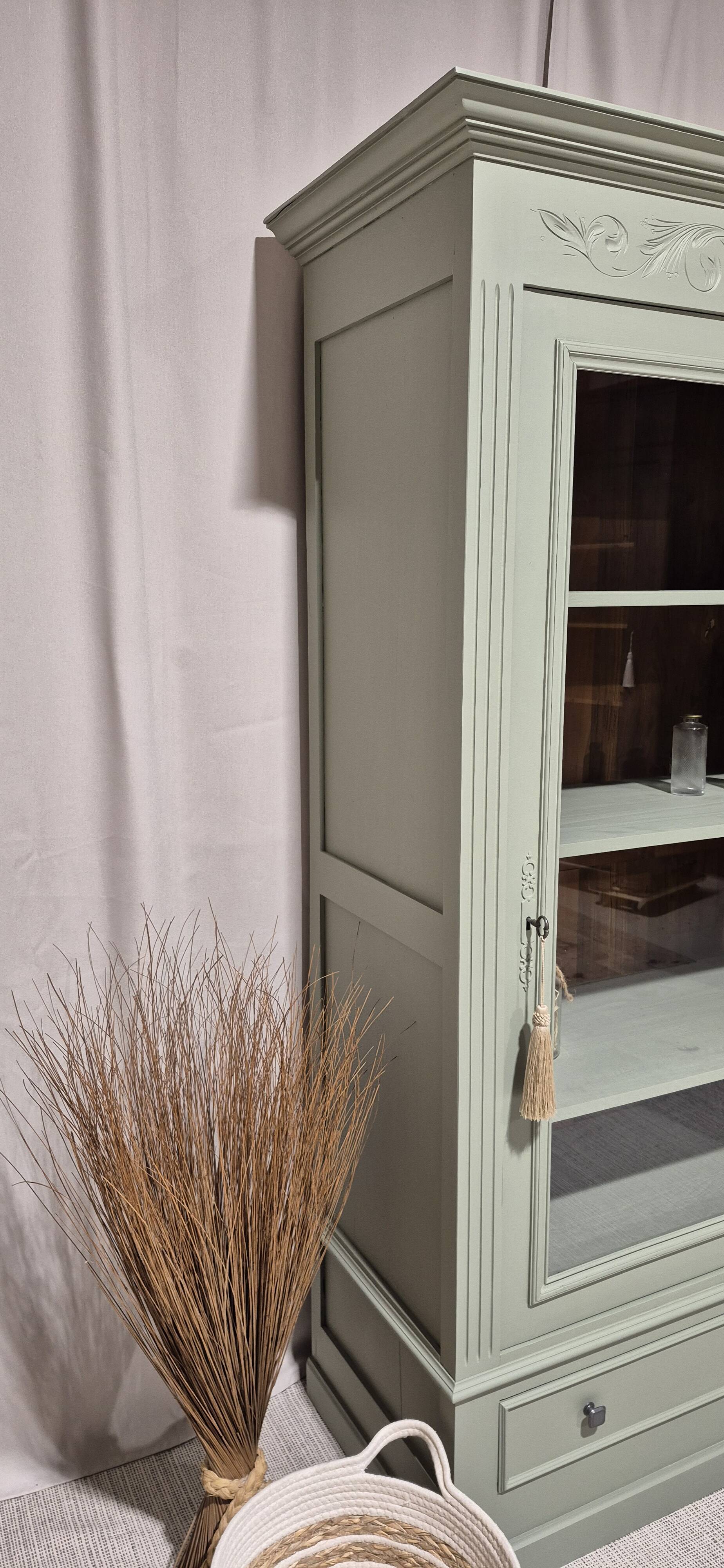Glass display cabinet with drawer