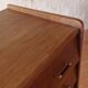Vintage slanted commode with tapered legs from the 1960s in golden oak.