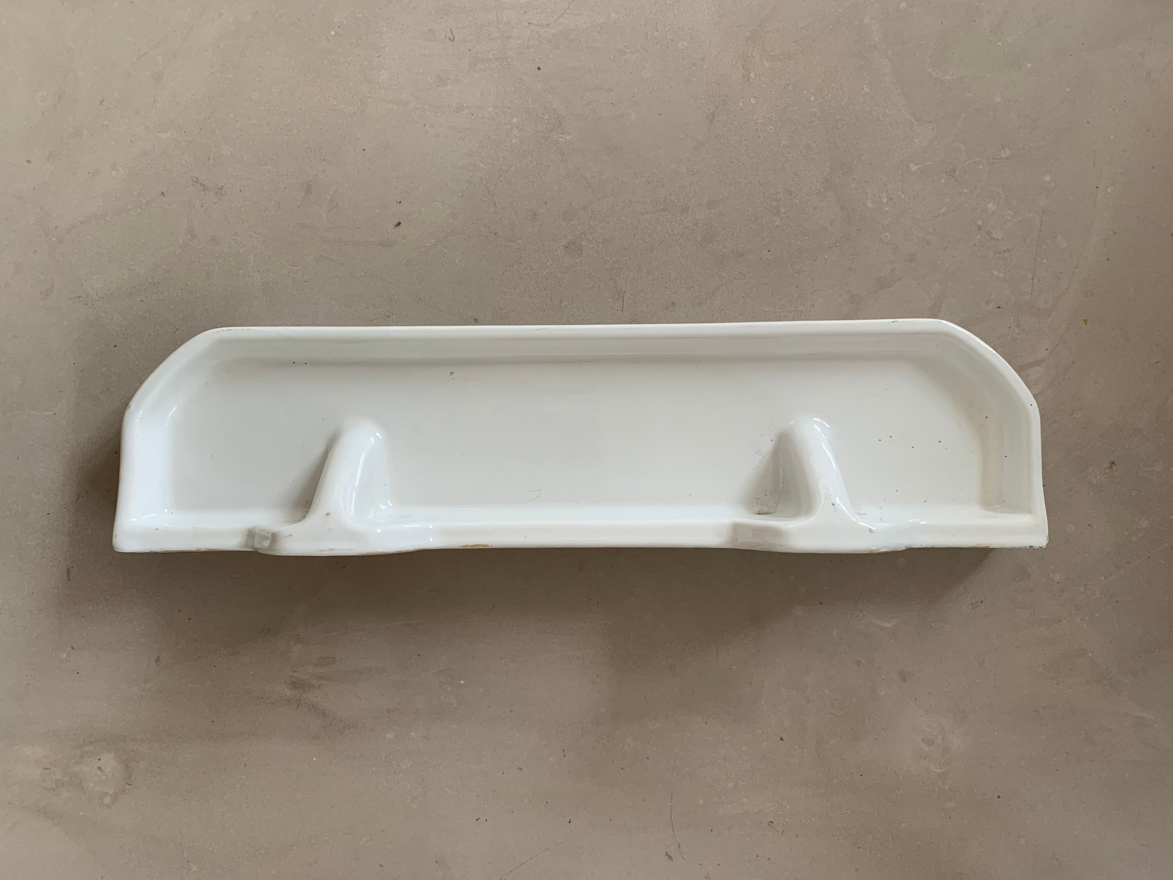 Antique ceramic wall shelf