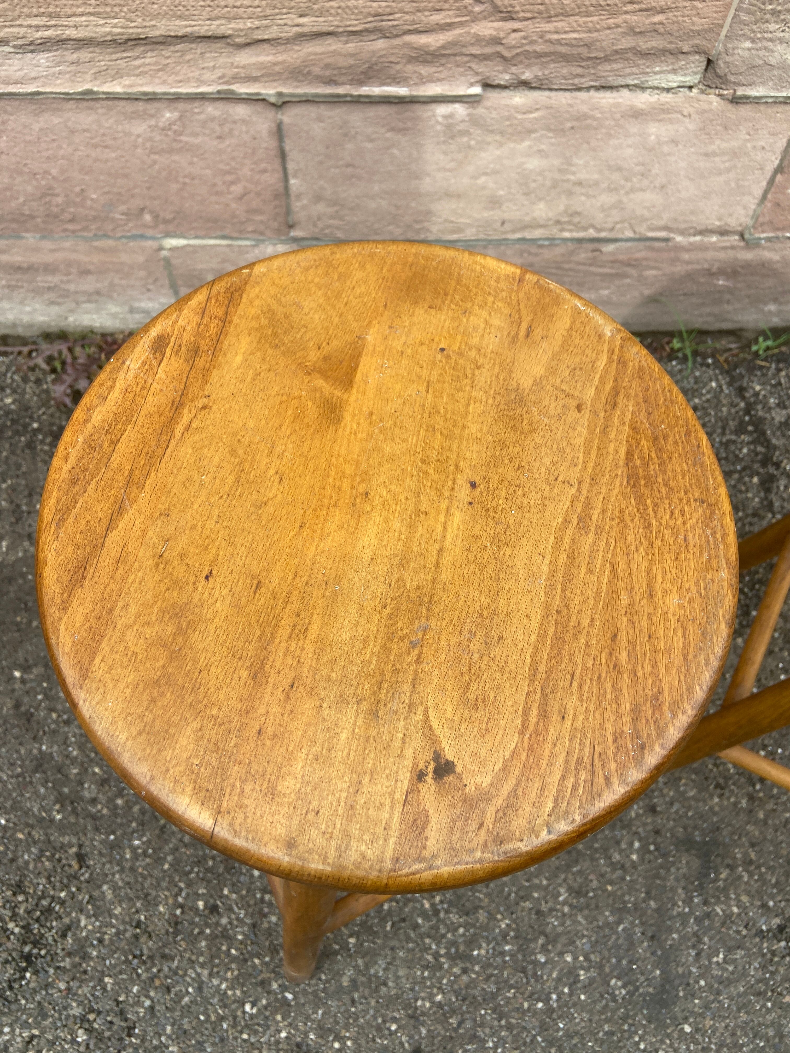 pair of vintage wooden bar stools