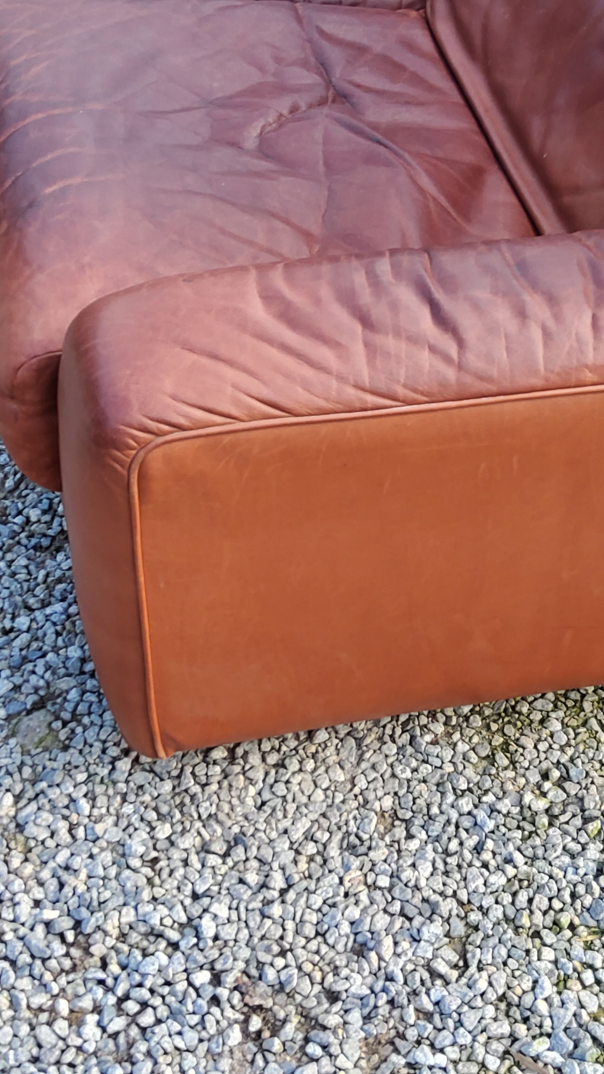 Pair of armchairs and De Sede sofa in cognac leather from the 70s/80s