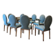 Table ghibli en verre avec 8 chaises parisiennes pieds sabrés roche bobois