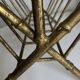 1960 magazine rack faux bamboo in beaten gold iron Italian craftsmanship